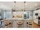 Gourmet kitchen with granite countertops, stainless steel appliances, and breakfast bar seating at 1820 Buckhead Valley Ne Ln, Atlanta, GA 30324