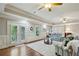 Spacious living room with high ceilings, large windows, and open layout for entertaining at 1820 Buckhead Valley Ne Ln, Atlanta, GA 30324