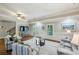 Inviting living room with large windows, fireplace, comfortable seating, and stylish decor at 1820 Buckhead Valley Ne Ln, Atlanta, GA 30324