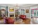 Cozy living room with a fireplace, hardwood floors, and stylish furniture arrangement at 1820 Buckhead Valley Ne Ln, Atlanta, GA 30324