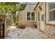 Charming stone patio featuring a fenced yard and brick exterior at 1820 Buckhead Valley Ne Ln, Atlanta, GA 30324