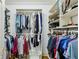 Spacious walk-in closet with ample shelving and hanging space for organized storage at 1820 Buckhead Valley Ne Ln, Atlanta, GA 30324