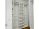 Spacious walk-in closet with custom shelving and wooden floors provides ample storage at 1820 Buckhead Valley Ne Ln, Atlanta, GA 30324