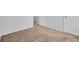 Bedroom with neutral walls, carpeted floors and closet door and hallway entry at 2143 Victoria Pl, Lithonia, GA 30058