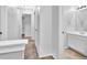 Clean hallway featuring fresh paint, with updated bathroom at 2143 Victoria Pl, Lithonia, GA 30058