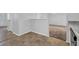 Open-concept kitchen with stainless steel dishwasher and eat-in kitchen area at 2143 Victoria Pl, Lithonia, GA 30058