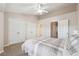 Bright bedroom with multiple closets and adjacent bathroom and hallway at 3182 Mill Springs Cir, Buford, GA 30519