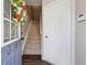 Entryway featuring stairs, a coat closet, and access to living areas at 3182 Mill Springs Cir, Buford, GA 30519