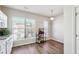 Bright kitchen nook area with wood-look flooring, perfect for casual dining, with great natural light at 3182 Mill Springs Cir, Buford, GA 30519