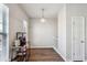 Bright kitchen nook featuring wood-look floors, great lighting, and room for a coffee bar at 3182 Mill Springs Cir, Buford, GA 30519
