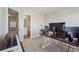Office space with neutral colors and adjacent bathroom at 3182 Mill Springs Cir, Buford, GA 30519