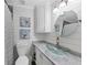 Charming bathroom with shiplap walls, marble countertop, and glass bowl sink at 980 Pine Grove Pointe Dr, Roswell, GA 30075