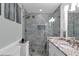 Modern bathroom with marble tile shower, granite countertop, and modern fixtures at 980 Pine Grove Pointe Dr, Roswell, GA 30075
