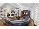 Spacious living room with vaulted ceilings, fireplace, hardwood floors and plenty of natural light at 980 Pine Grove Pointe Dr, Roswell, GA 30075