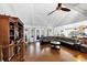 Spacious living room with vaulted ceilings, hardwood floors, and modern decor at 980 Pine Grove Pointe Dr, Roswell, GA 30075