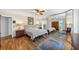 Spacious main bedroom features hard wood floors, ensuite bathroom and closet system at 980 Pine Grove Pointe Dr, Roswell, GA 30075