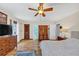 Large main bedroom with hard wood floors, ceiling fan, and natural light at 980 Pine Grove Pointe Dr, Roswell, GA 30075
