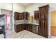 Well-appointed kitchen featuring stylish cabinetry, stainless steel appliances, and sleek countertops at 1703 Mission Park Dr, Loganville, GA 30052