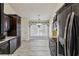 Bright kitchen features modern appliances, abundant cabinet space, and an adjacent dining area at 1703 Mission Park Dr, Loganville, GA 30052