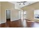 Spacious main bedroom with vaulted ceilings and gleaming hardwood floors at 1703 Mission Park Dr, Loganville, GA 30052
