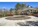 Community pool and clubhouse offers great outdoor gathering spaces at 173 Northshore Xing, Dallas, GA 30157