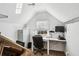 Bright home office space featuring modern desk, file cabinet, and window with natural light at 173 Northshore Xing, Dallas, GA 30157
