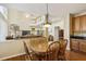 Open kitchen adjacent to the dining area, allowing for easy interaction and entertaining at 173 Northshore Xing, Dallas, GA 30157