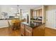 Spacious kitchen with a kitchen island and breakfast area with a breakfast bar for additional seating at 173 Northshore Xing, Dallas, GA 30157