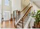 Bright foyer with tall ceilings and staircase leading to the upper level at 173 Northshore Xing, Dallas, GA 30157
