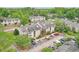 Aerial shot showcasing the complex, parking, and surrounding tree-lined landscape at 320 Park Ridge Cir, Marietta, GA 30068