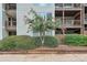 A well-maintained building with nicely landscaped grounds, shrubbery, and pink crepe myrtle at 320 Park Ridge Cir, Marietta, GA 30068