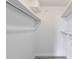 A well-organized closet with built in shelving and a metal hanging rod at 320 Park Ridge Cir, Marietta, GA 30068