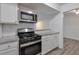 Kitchen featuring stainless steel microwave and oven at 320 Park Ridge Cir, Marietta, GA 30068