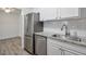 Updated kitchen featuring stainless steel refrigerator, dishwasher and sink at 320 Park Ridge Cir, Marietta, GA 30068
