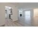 Open floor plan featuring updated light gray flooring and fireplace at 320 Park Ridge Cir, Marietta, GA 30068