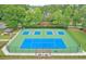 Community tennis courts with manicured landscaping, and shade structure at 320 Park Ridge Cir, Marietta, GA 30068