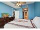 Comfortable bedroom with ceiling fan and dresser; access to the kitchen and bathroom can be seen at 3324 Peachtree Ne Rd # 814, Atlanta, GA 30326