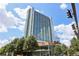 The high rise building features many balconies, and is set on a sunny day at 3324 Peachtree Ne Rd # 814, Atlanta, GA 30326