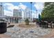 Outdoor pool area with seating and barbecue grill at 3324 Peachtree Ne Rd # 814, Atlanta, GA 30326