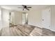 Bedroom features new floors, a ceiling fan, and two closets at 4953 Apple Valley Rd, Douglasville, GA 30135