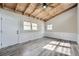 Large bonus room with vaulted wood ceiling and modern flooring at 4953 Apple Valley Rd, Douglasville, GA 30135