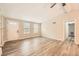 Bright living room showcasing new floors, fresh paint, and an open floor plan at 4953 Apple Valley Rd, Douglasville, GA 30135