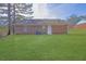 The backyard features a well-maintained lawn and a full brick home exterior at 520 Crick Pt, Palmetto, GA 30268