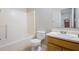 Bathroom features a shower and tub combination and a vanity at 520 Crick Pt, Palmetto, GA 30268