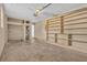 Spacious garage with shelving units and access to other house areas at 520 Crick Pt, Palmetto, GA 30268