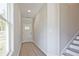 Bright entryway featuring neutral walls and a staircase at 101 Priestwood Ln, Acworth, GA 30102