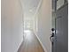 Inviting hallway with sleek flooring and ample natural light, leading into the home at 101 Priestwood Ln, Acworth, GA 30102