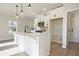 Bright kitchen featuring a large island with seating, modern appliances, and a clean design at 101 Priestwood Ln, Acworth, GA 30102