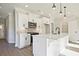 Modern kitchen with white cabinetry, a spacious island, and stainless steel appliances at 101 Priestwood Ln, Acworth, GA 30102