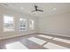 Bright living room filled with natural light showcases beautiful flooring and trim details at 101 Priestwood Ln, Acworth, GA 30102
